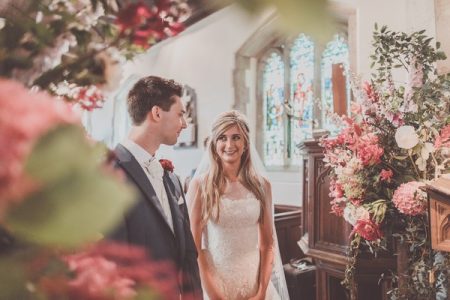 Bride smiling at groom during wedding ceremony - Picture by Michelle Lindsell Photography