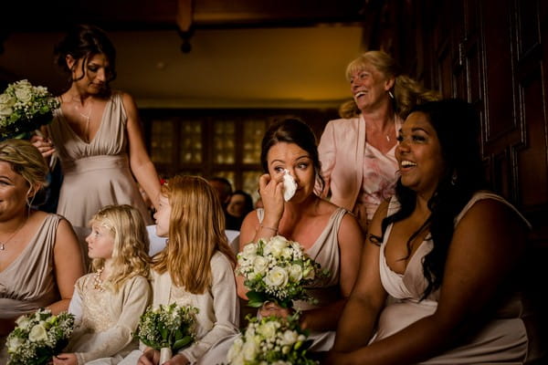 Bridesmaid wiping away tear - Picture by Steve Grogan Photography