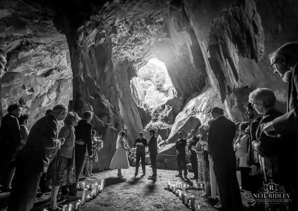 Wedding ceremony in a cave - Picture by Neil Ridley Photography