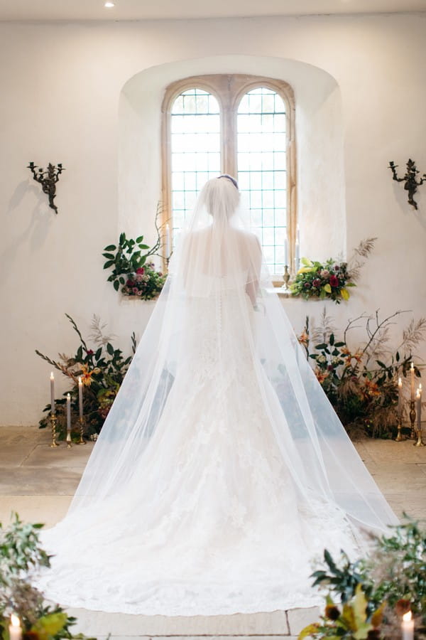 Back of bride with long veil
