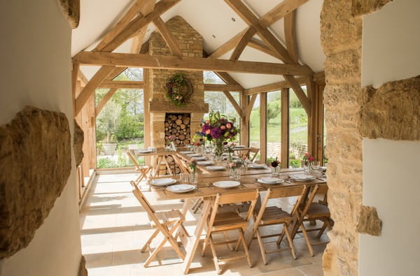 Rustic wedding table in beamed room