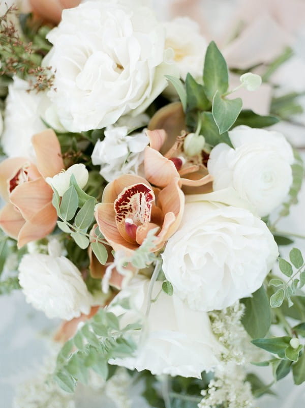 Peach and white flowers of bridal bouquet