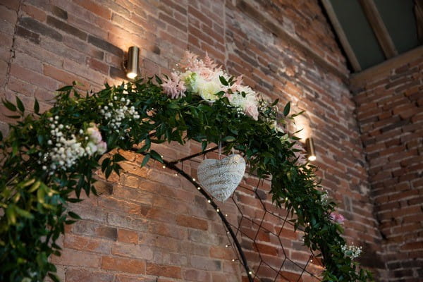 Wedding Ceremony Arch of Foliage and Flowers