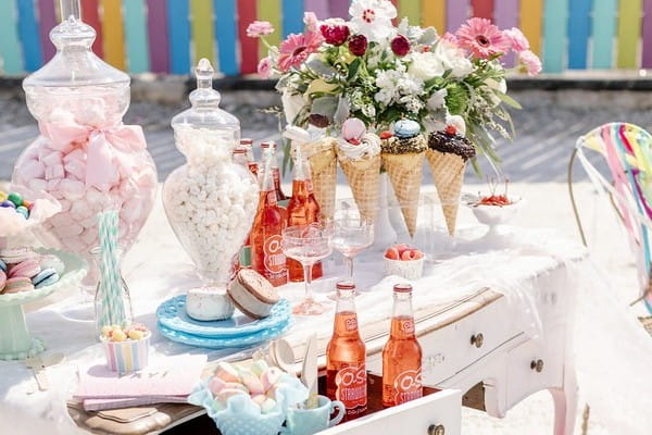 Table with ice cream and sweet treats for hen party