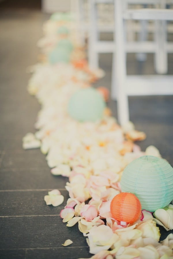 Wedding Ceremony Styling with Petals and Lanterns Down Aisle