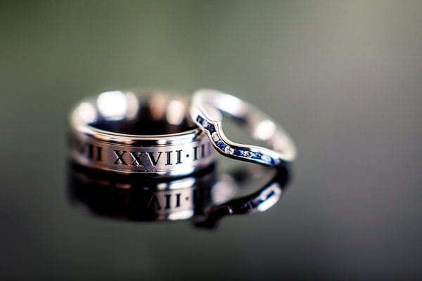 Wedding rings with Roman numeral engraving