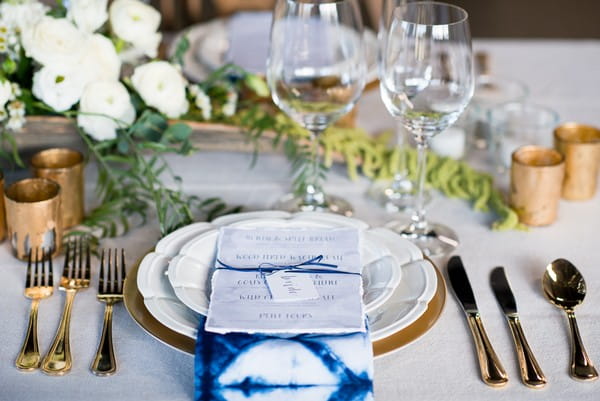 Wedding place setting with indigo Shibori napkin