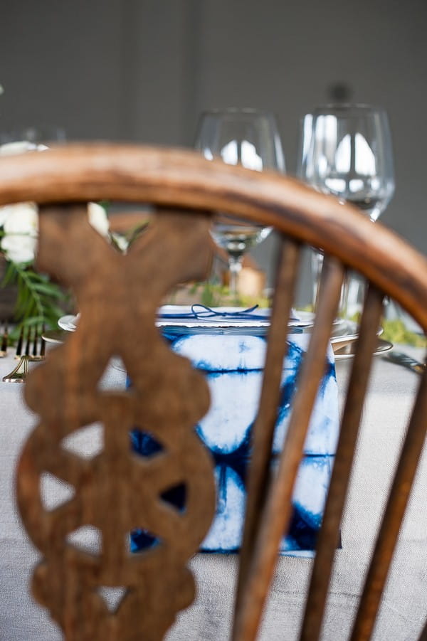 Wedding table seen through chair