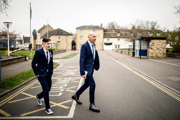 Groom and best man crossing road