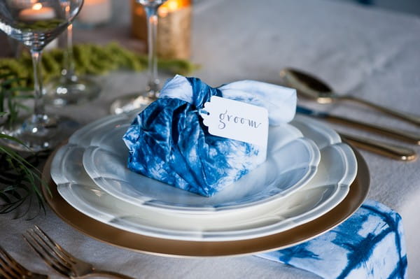 Indigo Furoshiki wrapped gift on wedding plate