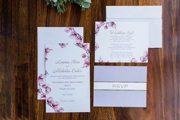Wedding stationery with purple floral design