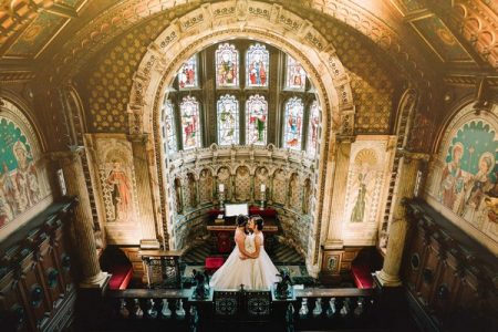 Two brides kissing in Crewe Hall - Picture by James Andrew Photography