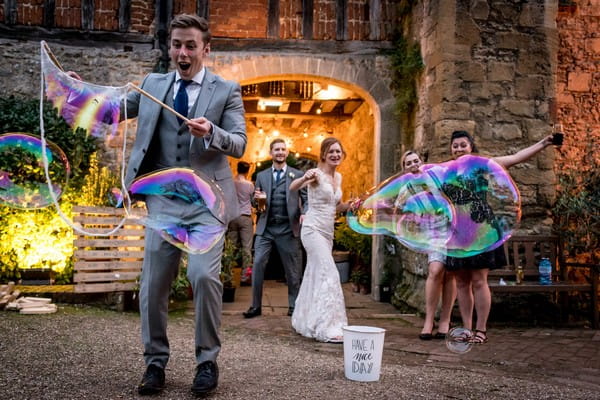 Man making giant bubbles at wedding - Picture by Matt Badenoch Photography