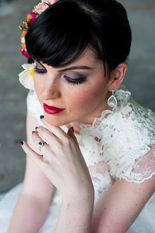 Bride with hand under her chin