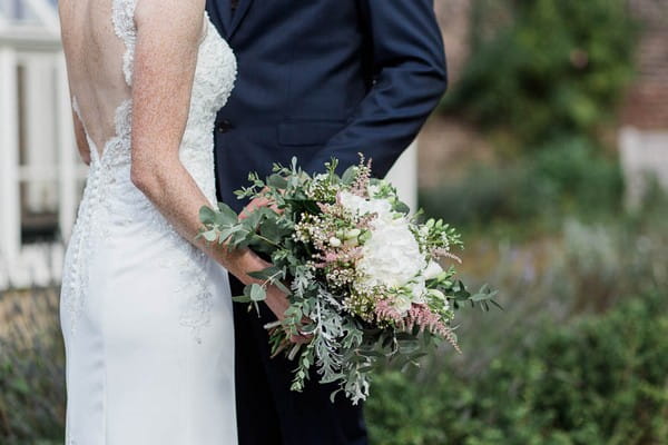 Bride's white flower and foliage bouquet