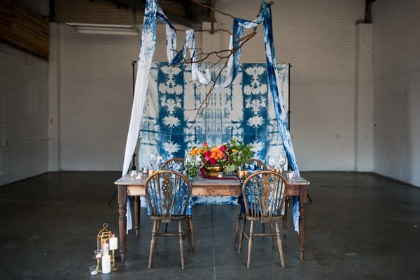 Table with indigo Shibori wedding backdrop