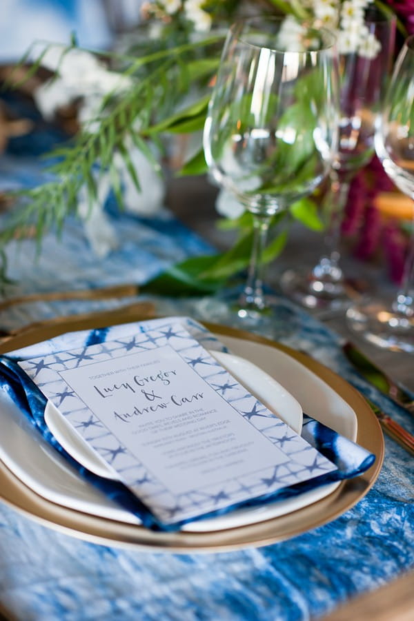 Indigo Shibori style wedding invitation on plate