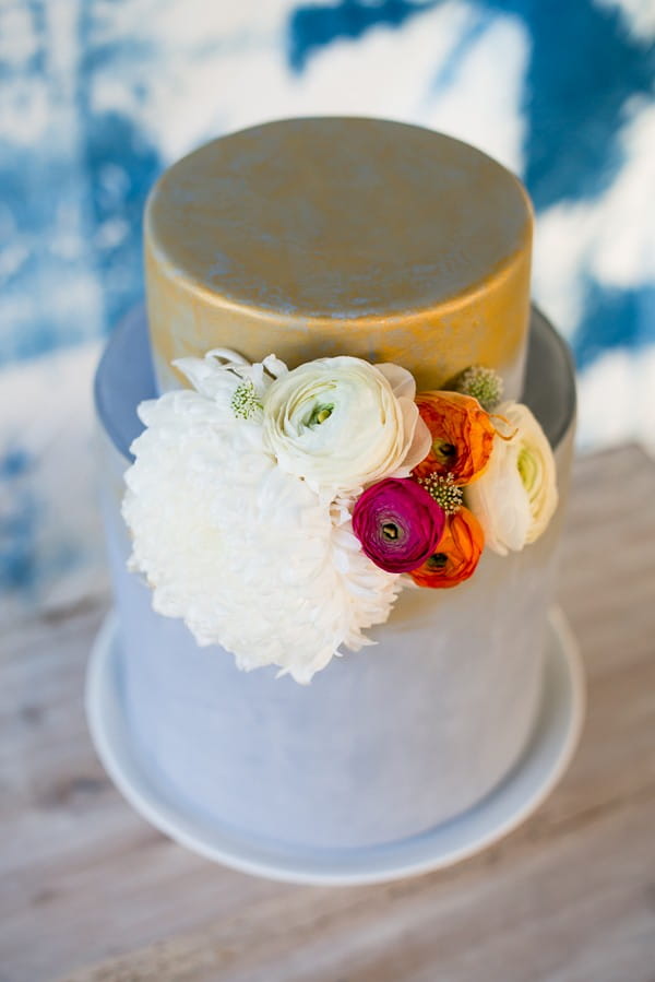 Gold and light blue wedding cake