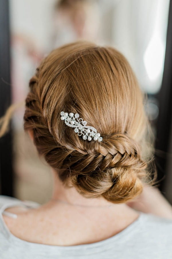 Bride's braided updo wedding hairstyle