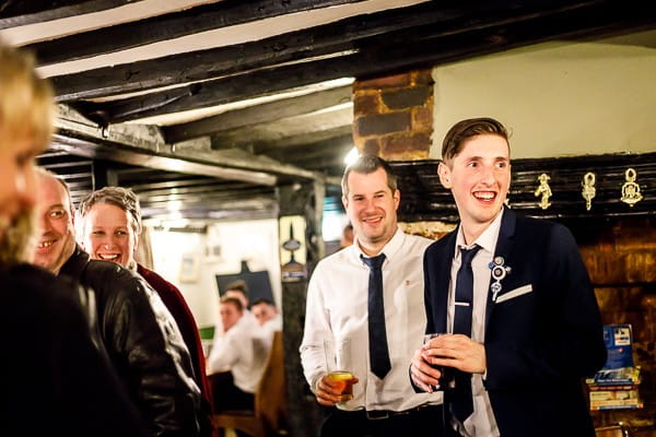 Wedding guests in pub