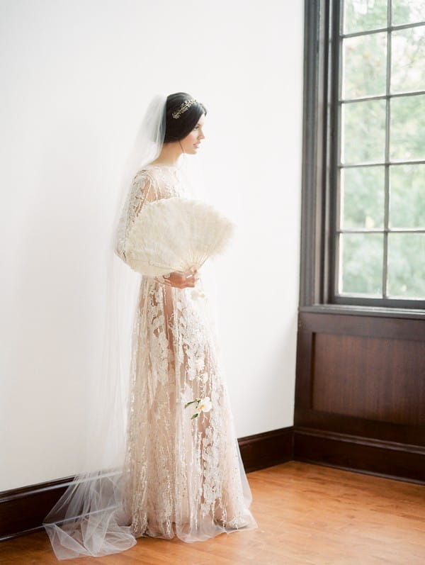 Bride holding fan