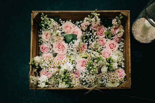 Box of pink wedding flowers