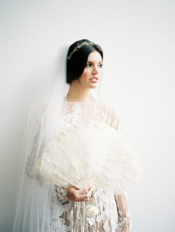 Bride holding fan