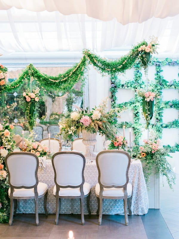 Foliage displays on and around wedding table