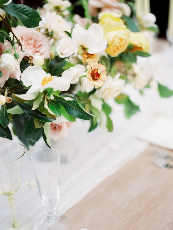 White and yellow wedding table flowers