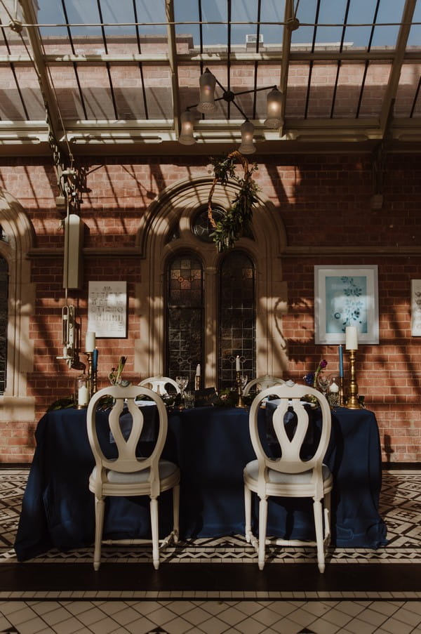 Small wedding table with dark styling