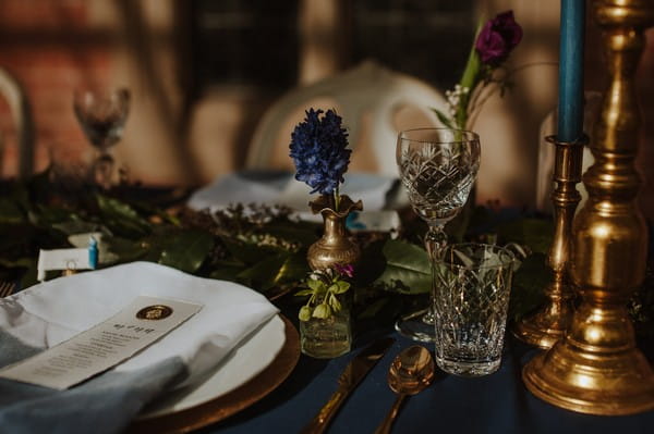 Single stem flowers on wedding table