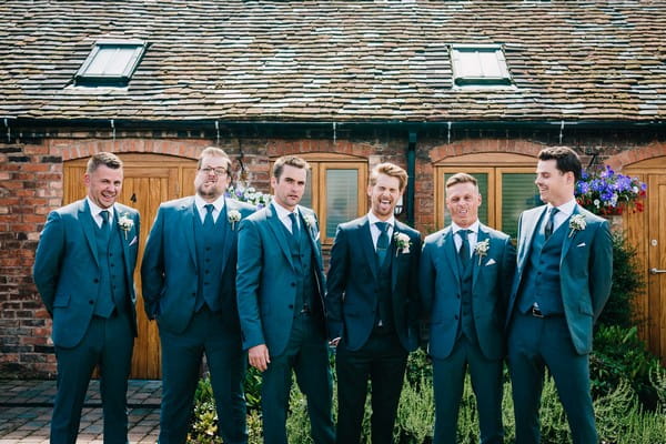 Groomsmen pulling silly faces