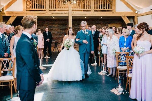 Father walking bride down the aisle at Mythe Barn