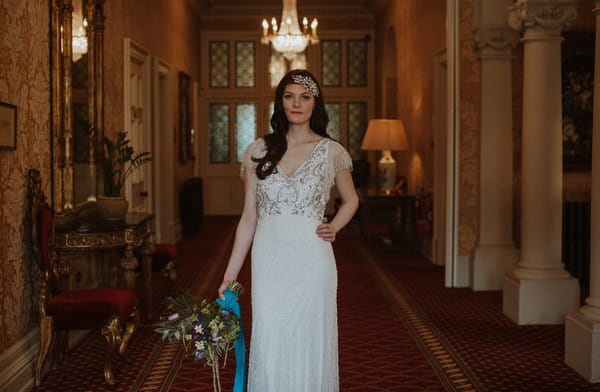 Bride standing in hall at Kilworth House