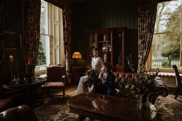 Bride and groom in drawing room at Kilworth House