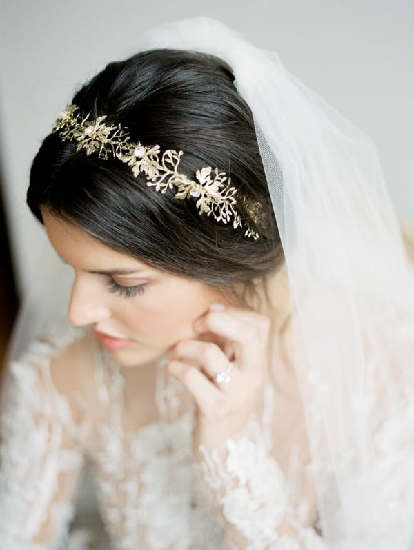 Bride wearing gold crown