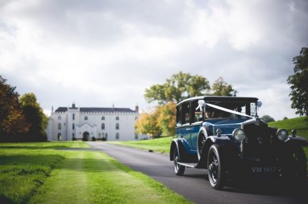 Classic car on drive of Combermere Abbey