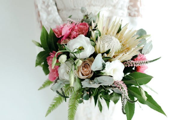 Bridal bouquet with large white and pink flowers