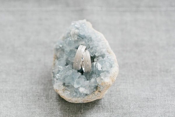 Wedding rings in middle of quartz crystal