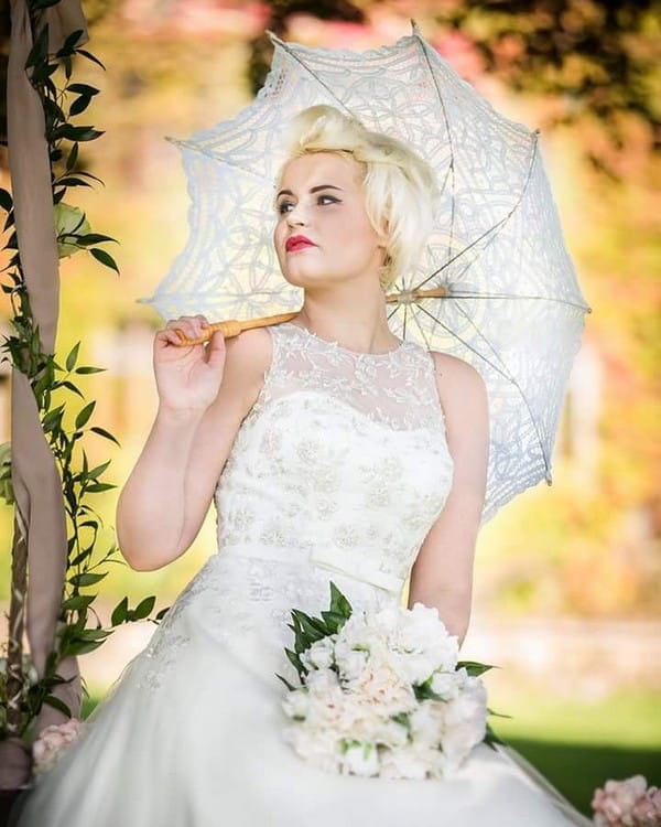 Retro bride with parasol - Picture by Peter Rollings Photography