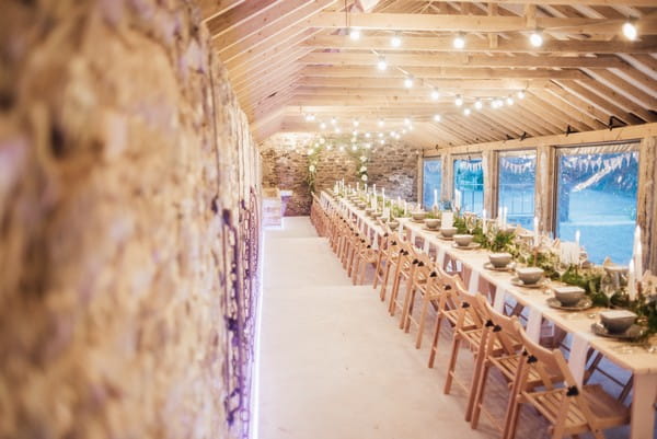 Rustic wedding styling in The Cowyard Barn at Pengenna Manor