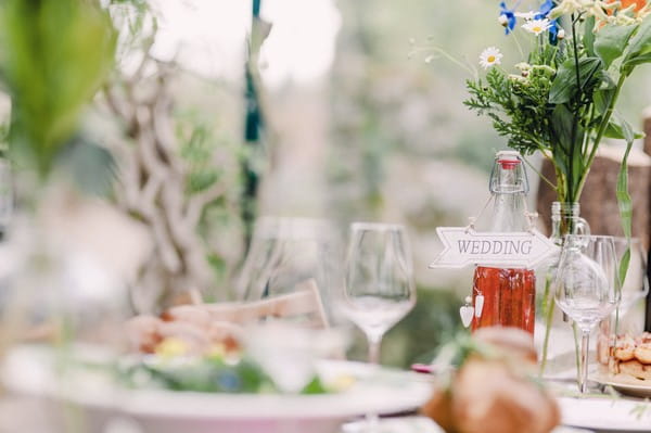 Wedding arrow sign on bottle