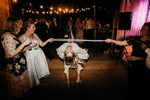 Bride limbo dancing