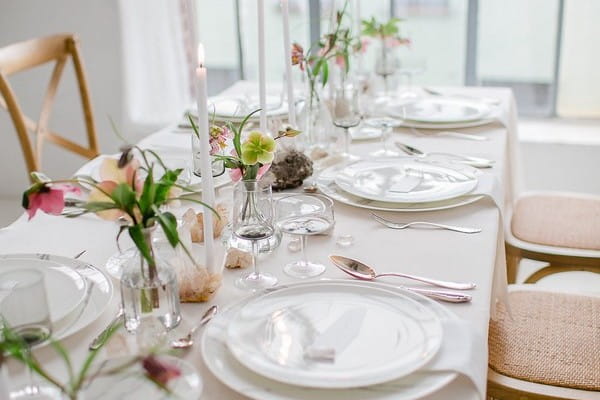 Wedding table styling with hellebore and quartz crystals