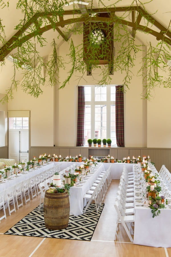 Vintage Wedding Styling with Rugs in Village Hall