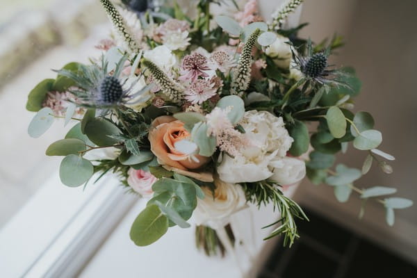 Close up of flowers and foliage in bridal bouquet