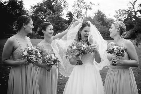 Bride laughing with bridesmaids - Picture by Bethany Lloyd-Clarke Photography