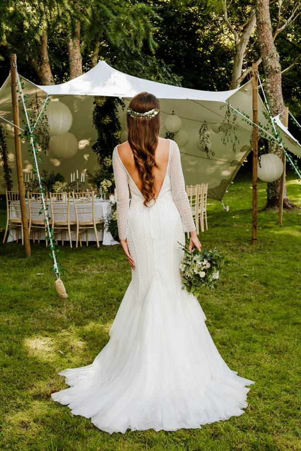Back of bride's wedding dress with V back