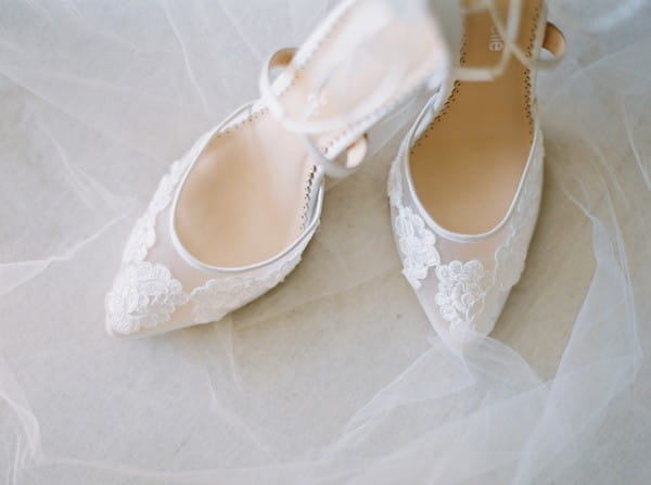 Lace flower detail on bridal shoes