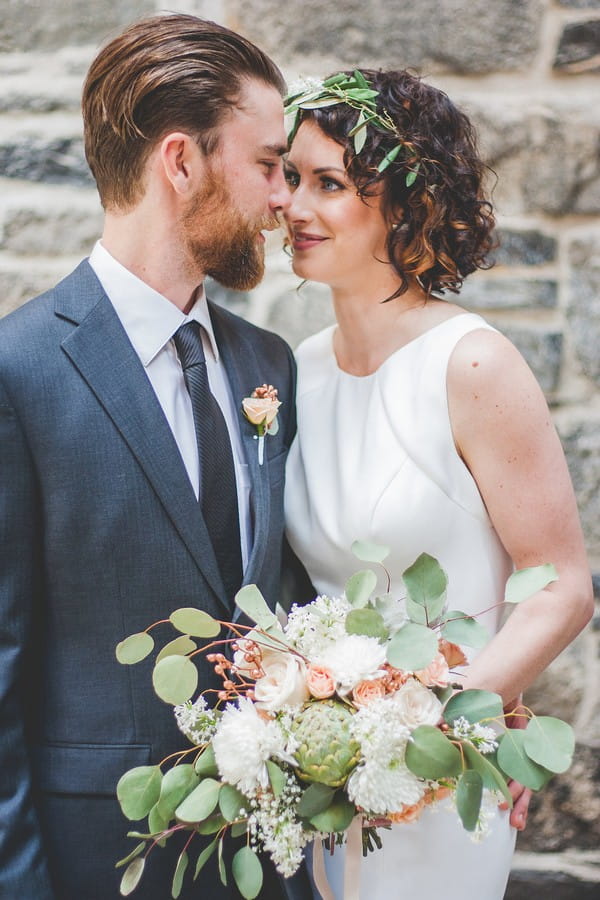 Bride and groom staring into each others eyes